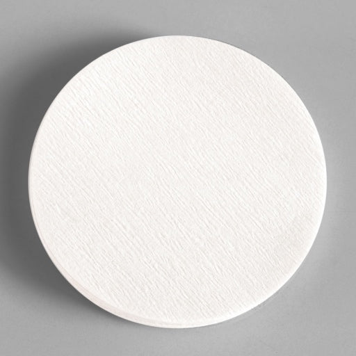 A stack of Esspero filter papers for espresso viewed from above